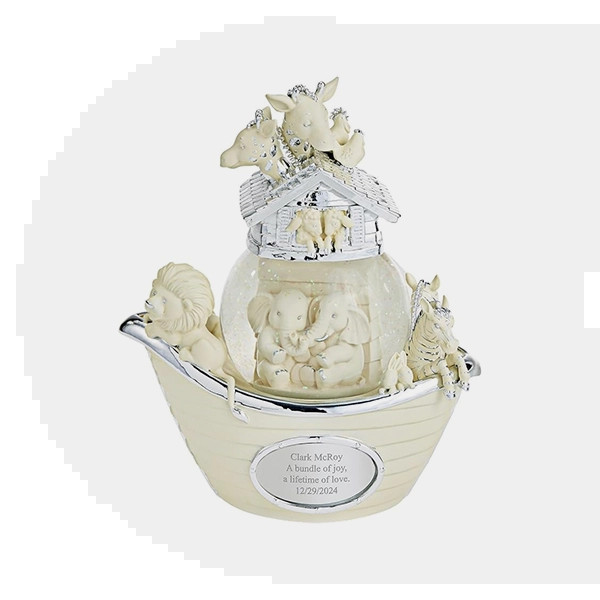 Noah's Ark Musical Snow Globe from Things Remembered, a customizable and charming baptism gift, playing &quot;Talk to the Animals&quot;.