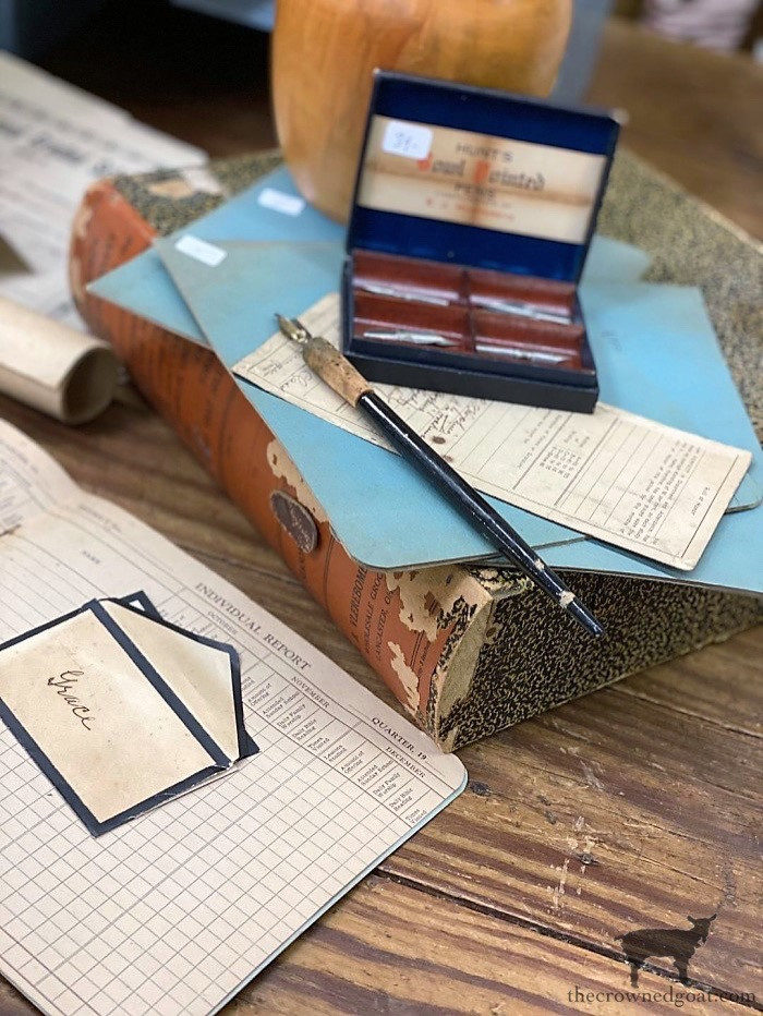 Vintage art supplies, such as paintbrushes and calligraphy pens, displayed to highlight their antique charm and appeal to creative individuals.