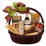 Italian gift basket with pasta, sauce, cheese, and wine
