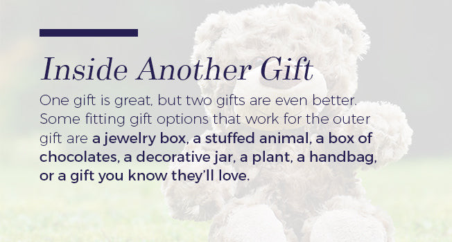 Necklace hidden inside a box of chocolates, illustrating the surprise of finding a gift within a gift