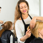hairdresser trimming hair