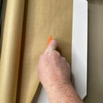 Measure wrapping paper for Xmas gift box