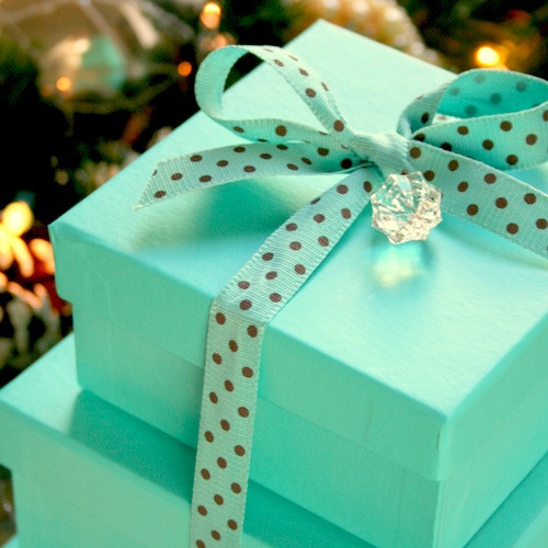 Turquoise stacked gift boxes, beautifully wrapped, perfect for showcasing thoughtful gifts for lawyers